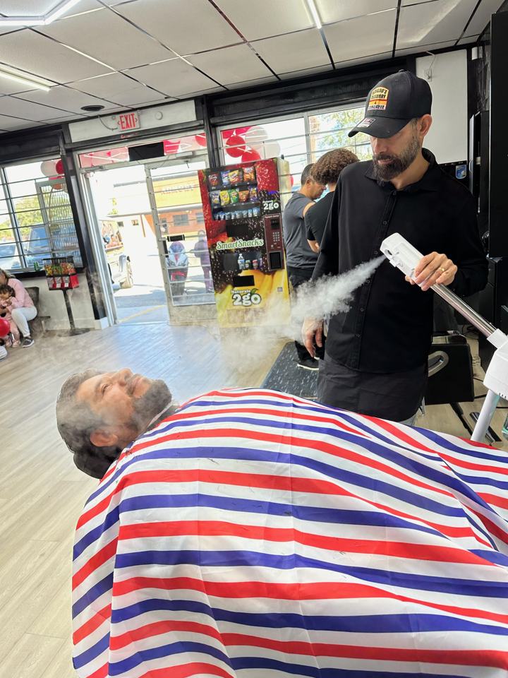 Barber at work in the barbershop area