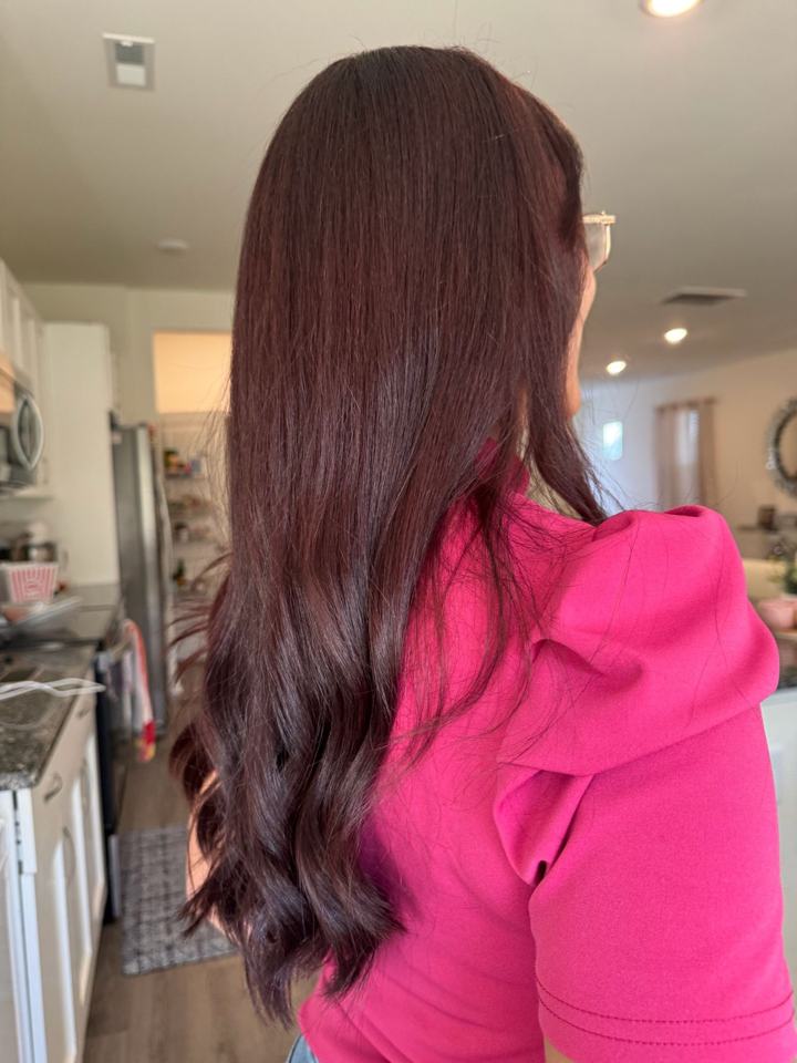 Long dark red hair, back view